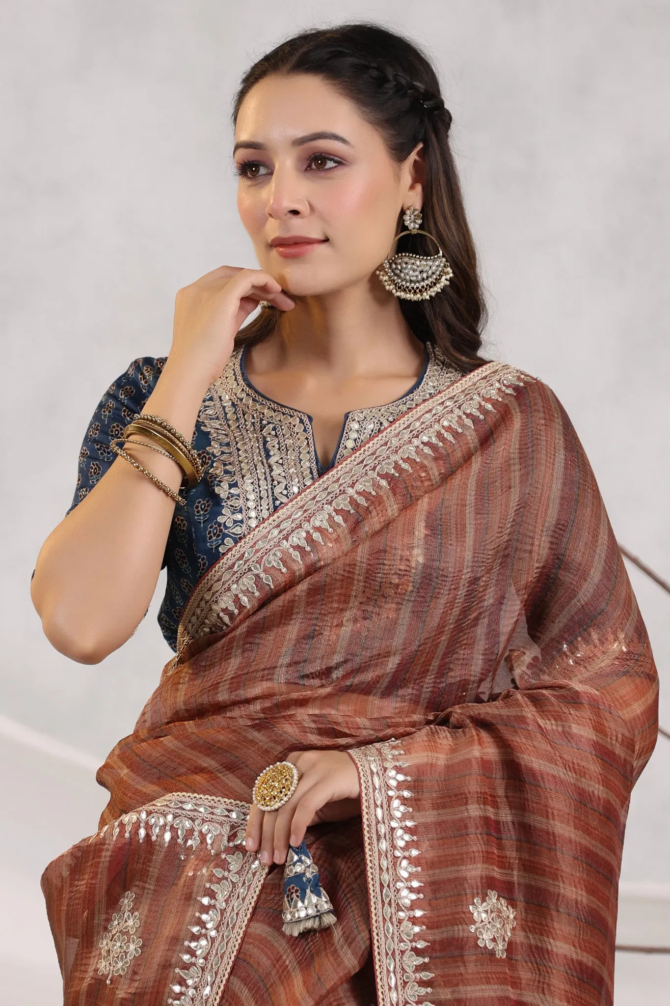 91Z248-RO Brown Striped Organza Saree with Blue Embroidered Blouse