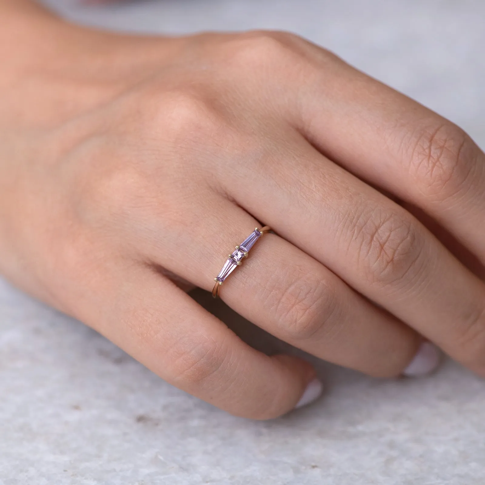 Lilac needle baguette ring