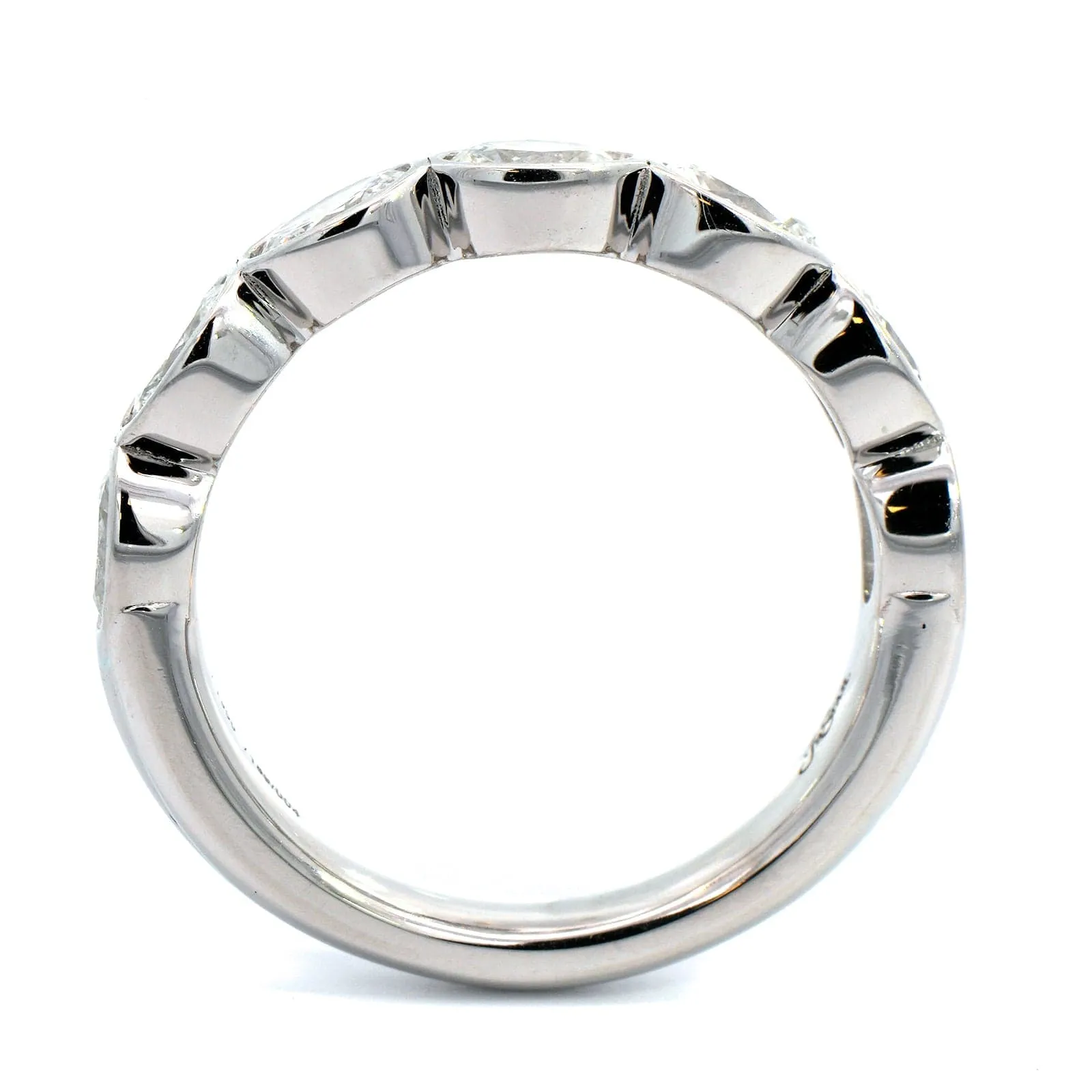 Platinum Bezel Set Oval Diamond Band